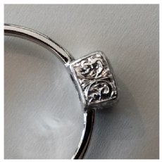 Custom Ring with Engraved Bezel
